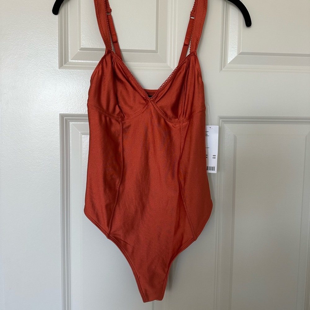 Terracotta colored bodysuit